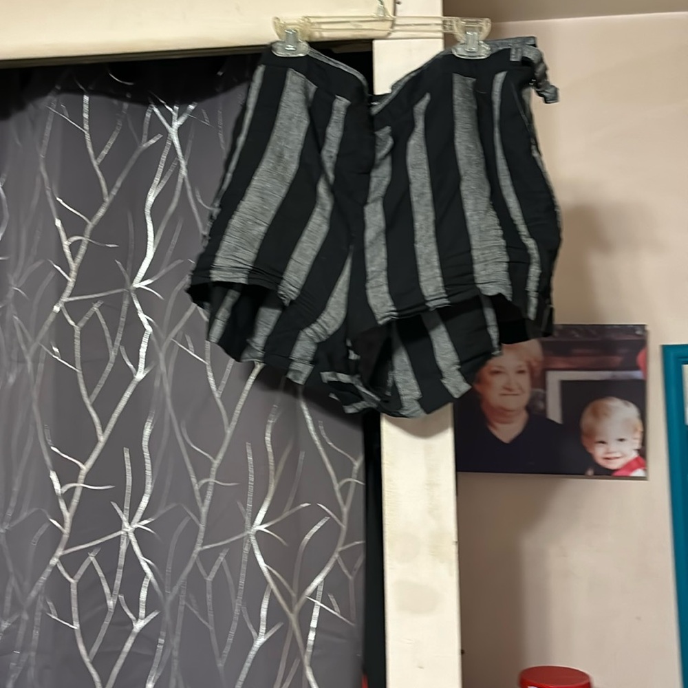 Black and gray shorts with the elastic waist